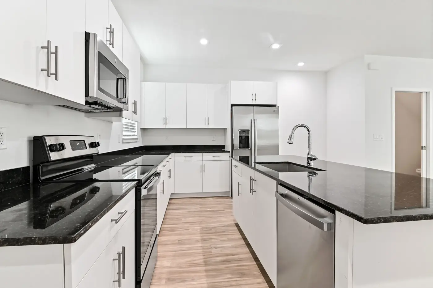 Kitchen with island and stainless appliances